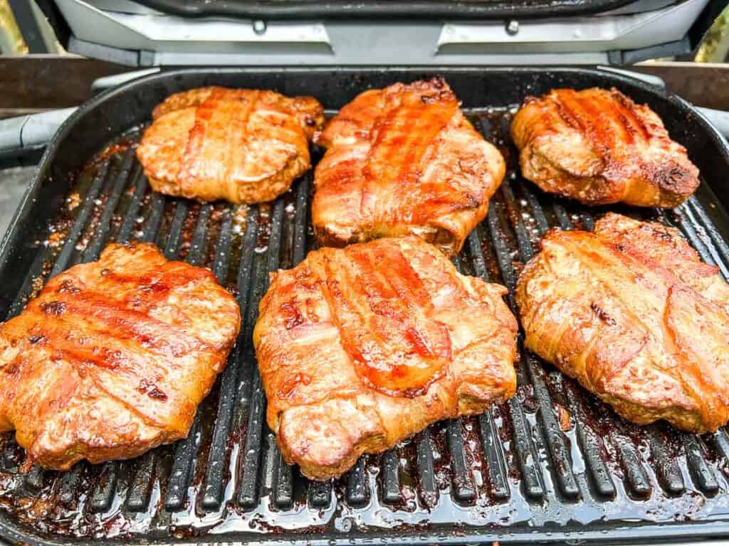 Bacon wrapped burgers on the Ninja Grill.