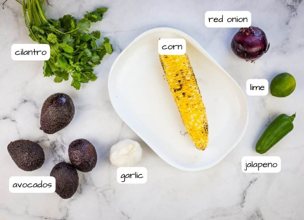 Labeled ingredients to make Grilled Corn Guacamole.