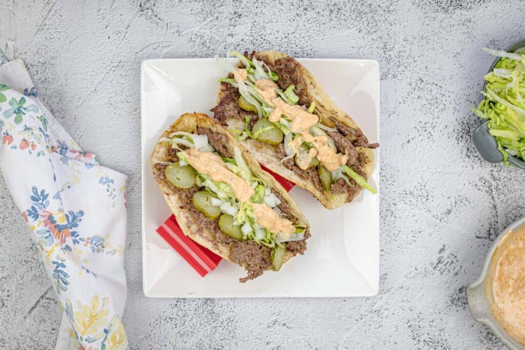 Blackstone Griddle Big Mac Tacos on a square white plate.