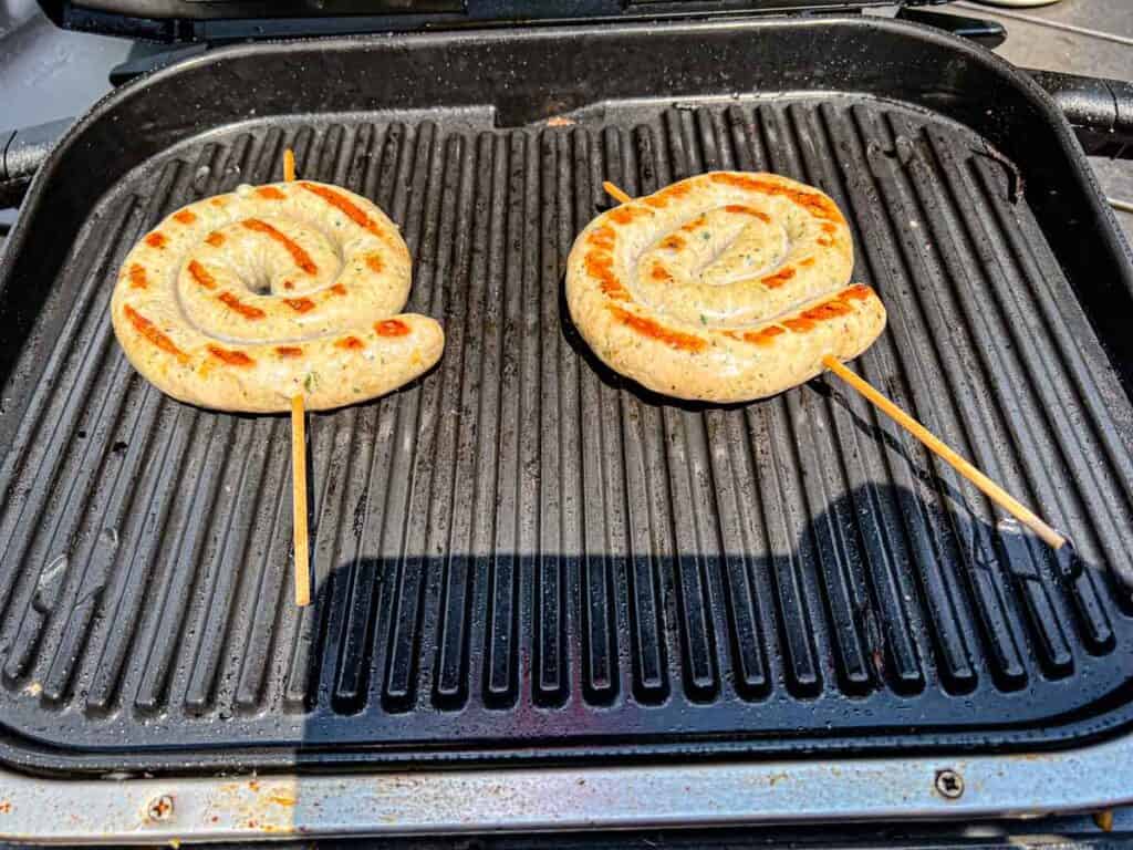 Keep cooking the sausage.