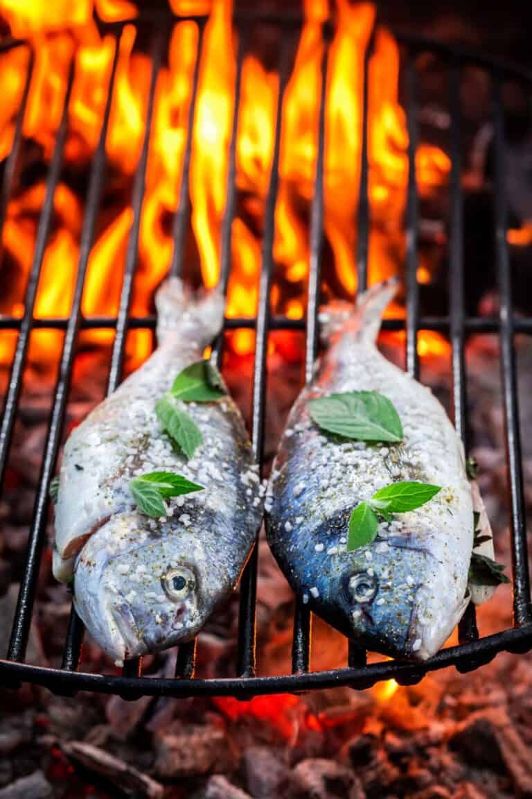 Two fishes grilling.