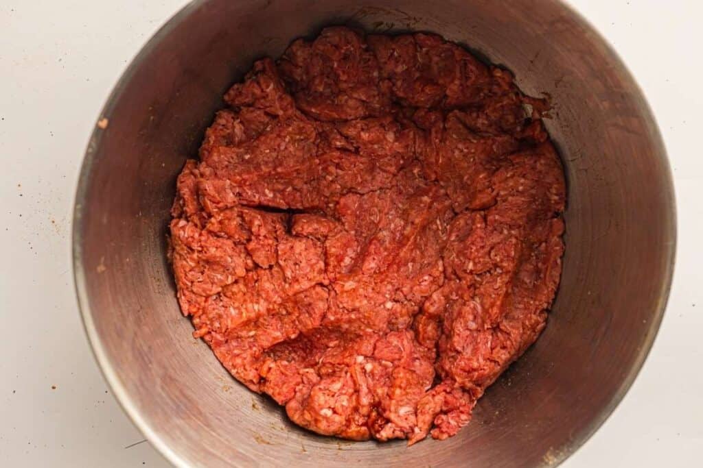 Mix gently just until the seasonings are evenly distributed.