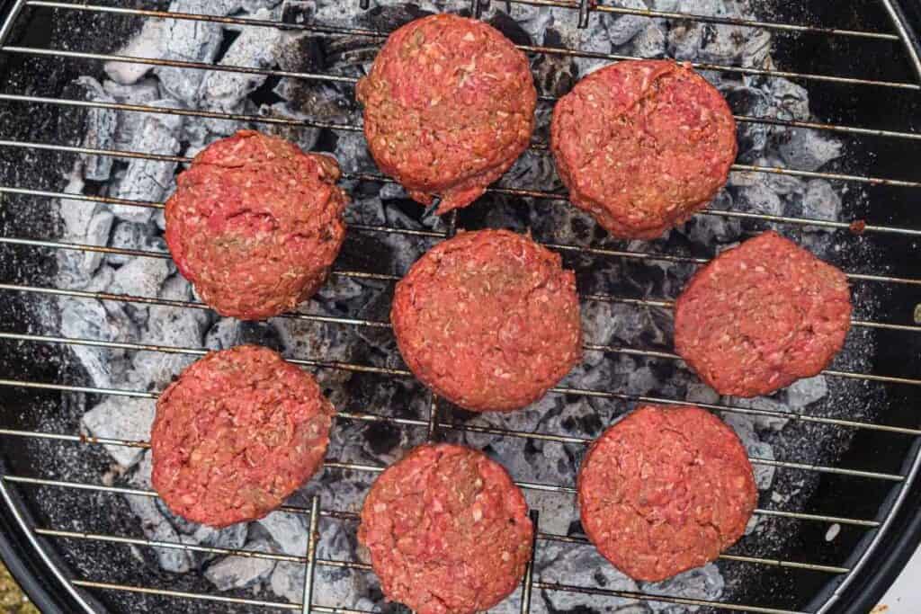 Place the patties on the hot side of the grill.