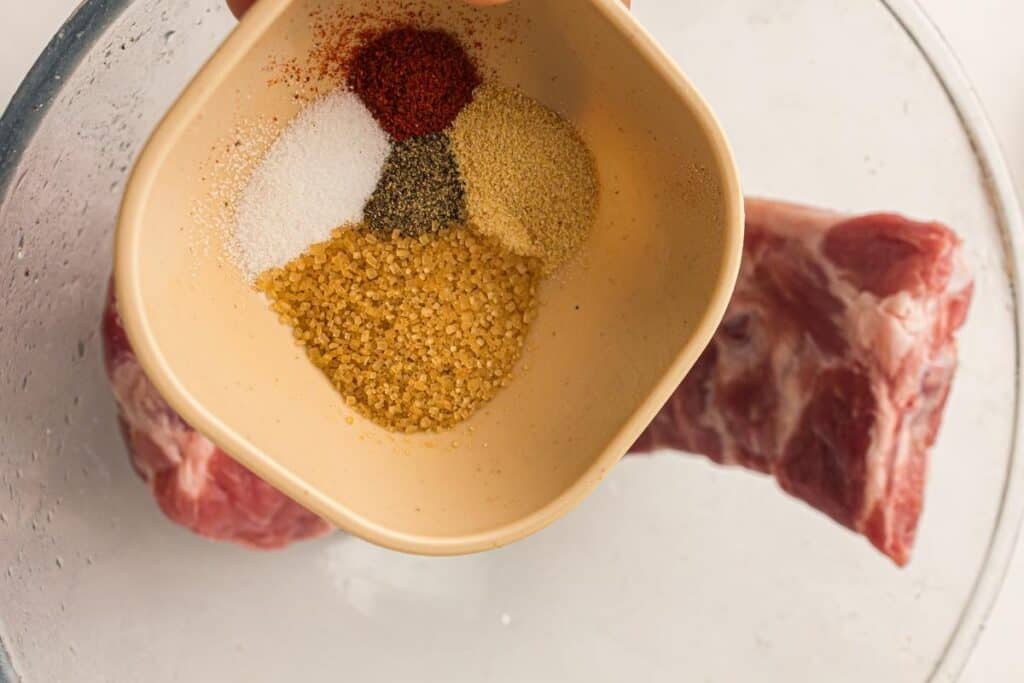 In a small bowl, mix the brown sugar, smoked paprika, garlic powder, salt, and black pepper.