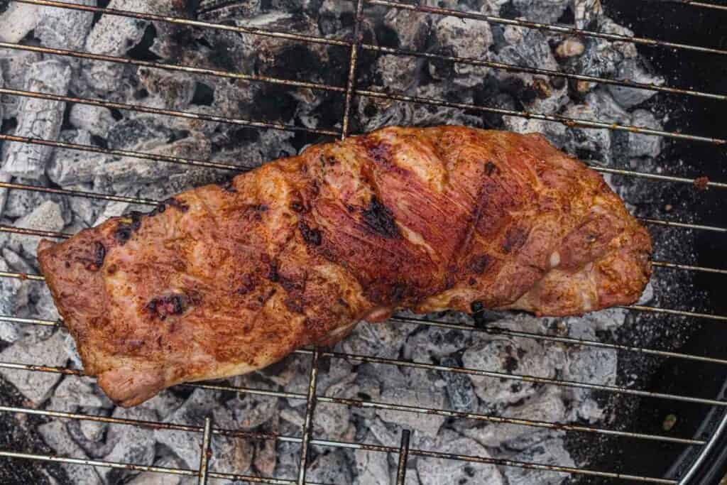 Turn the ribs once about halfway through cooking .