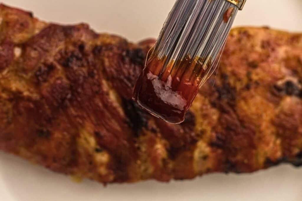Brush the BBQ sauce onto the ribs during the final 3 minutes of cooking.