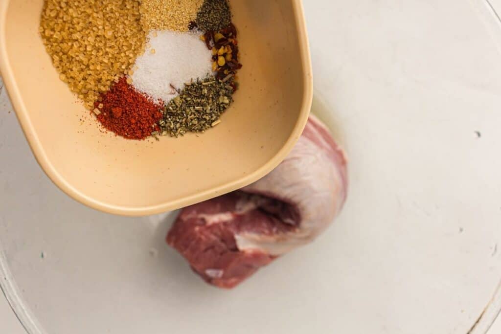 Coat the tenderloin evenly in the seasoning blend.